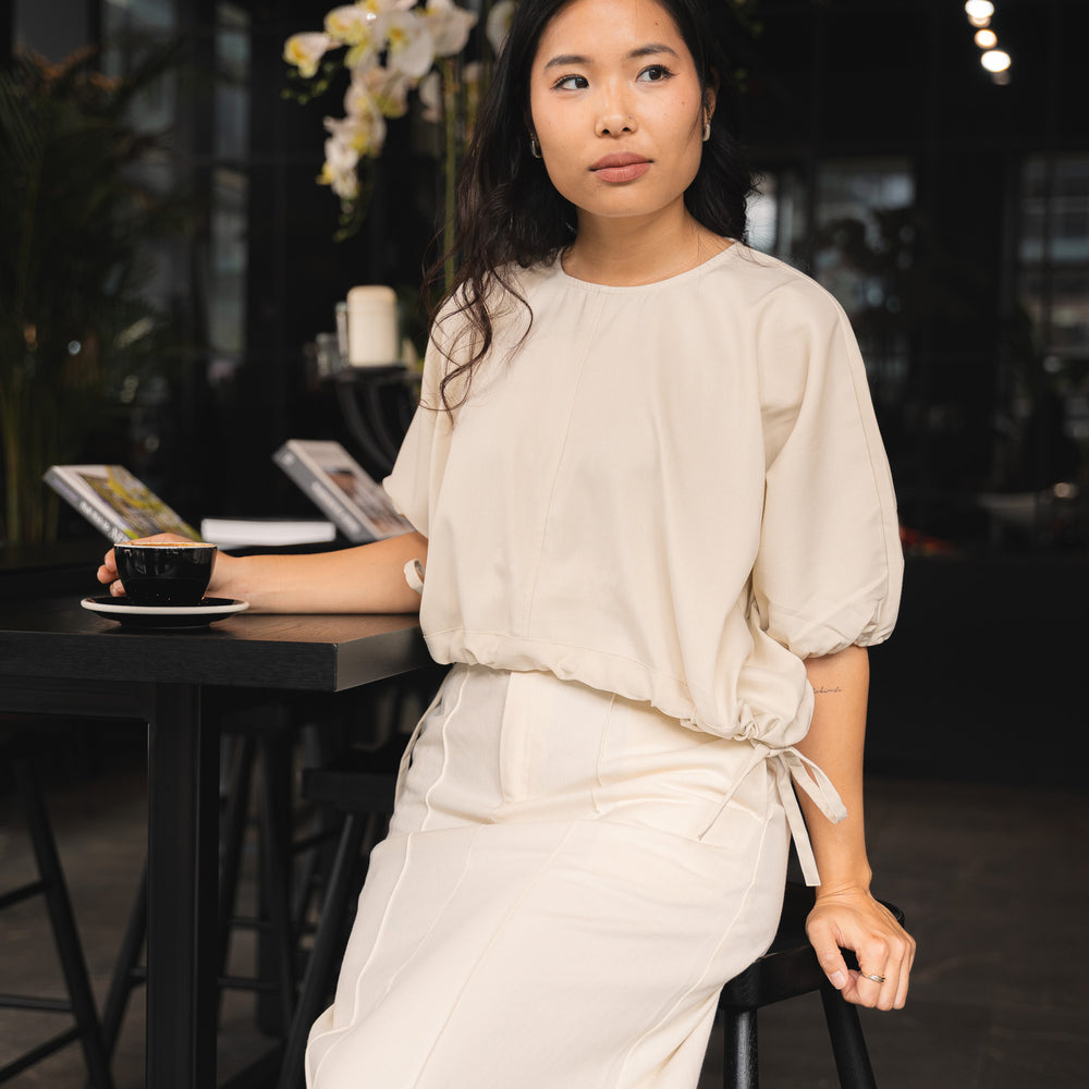 
                  
                    Drawstring Cropped Blouse- Cream
                  
                